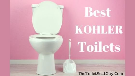 White Toilet In Front Of Pink Wall